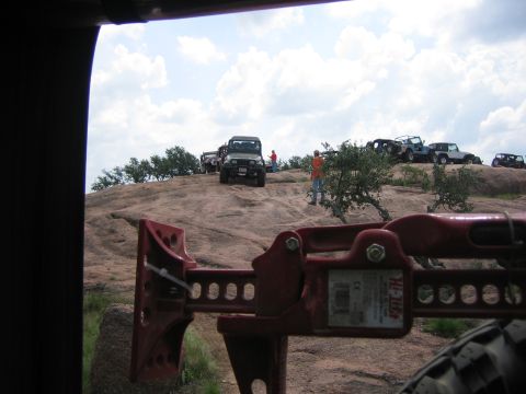 2001 Jeep Wrangler - Several 2001 Jeep Wranglers navigate a rocky landscape during a Jeep Jamboree event.