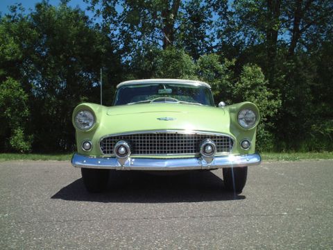 1956 Ford Thunderbird - Front view of a 1956 Ford Thunderbird in a light green color.