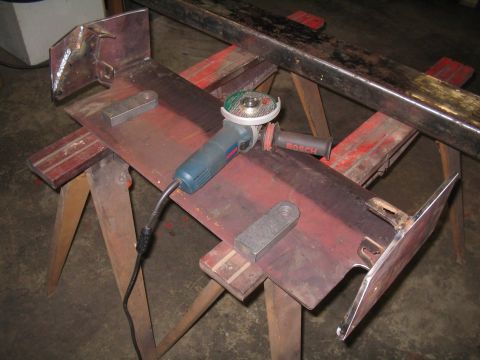 1979 Ford Bronco - Metal fabrication parts are being worked on with an angle grinder.