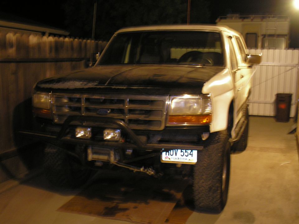 1990 Ford Bronco front view with aftermarket bumper and winch