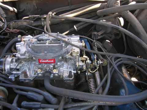 1978 Ford F-250 - Close-up of an Edelbrock carburetor, likely from a classic vehicle.