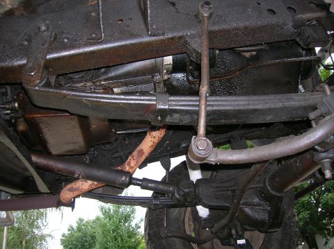 1978 Ford F-250 - Undercarriage view of a 1978 Ford F-250, highlighting suspension and exhaust components.