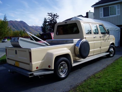2000 Ford E350 - This modified van-based pickup truck has a long wheelbase and dual rear wheels.