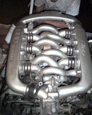 1989 Ford Taurus - This is my engine when i had the intake off so that i could replace the valve gaskets. I was just about ready to lower it back in. (that's…