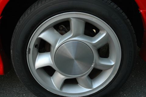 1993 Ford Mustang - Close-up of a 1993 Ford Mustang Cobra's wheel and tire.
