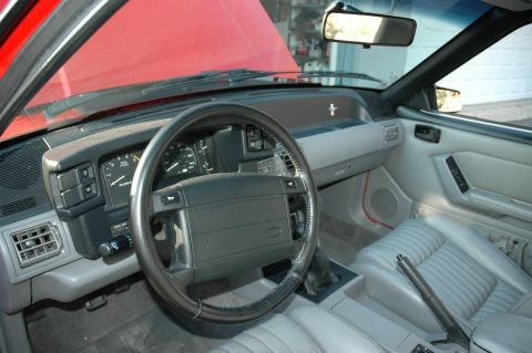 1993 Ford Mustang - Interior view of a 1993 Ford Mustang Cobra, highlighting the dashboard and seating.