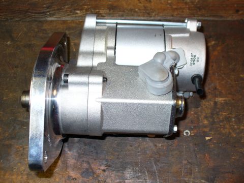 1978 Ford Bronco - A silver mini starter is shown, with visible part numbers indicating its specific model.