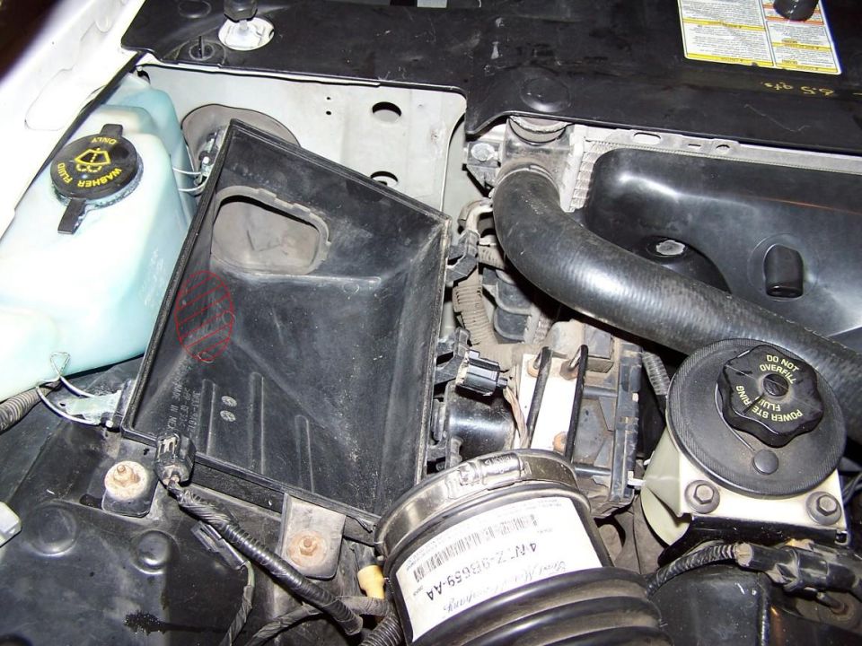 Airbox bottom installed with access location marked
