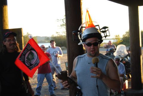 1979 Ford Bronco - Outdoor gathering with people, one man wearing a unique helmet and holding a microphone.