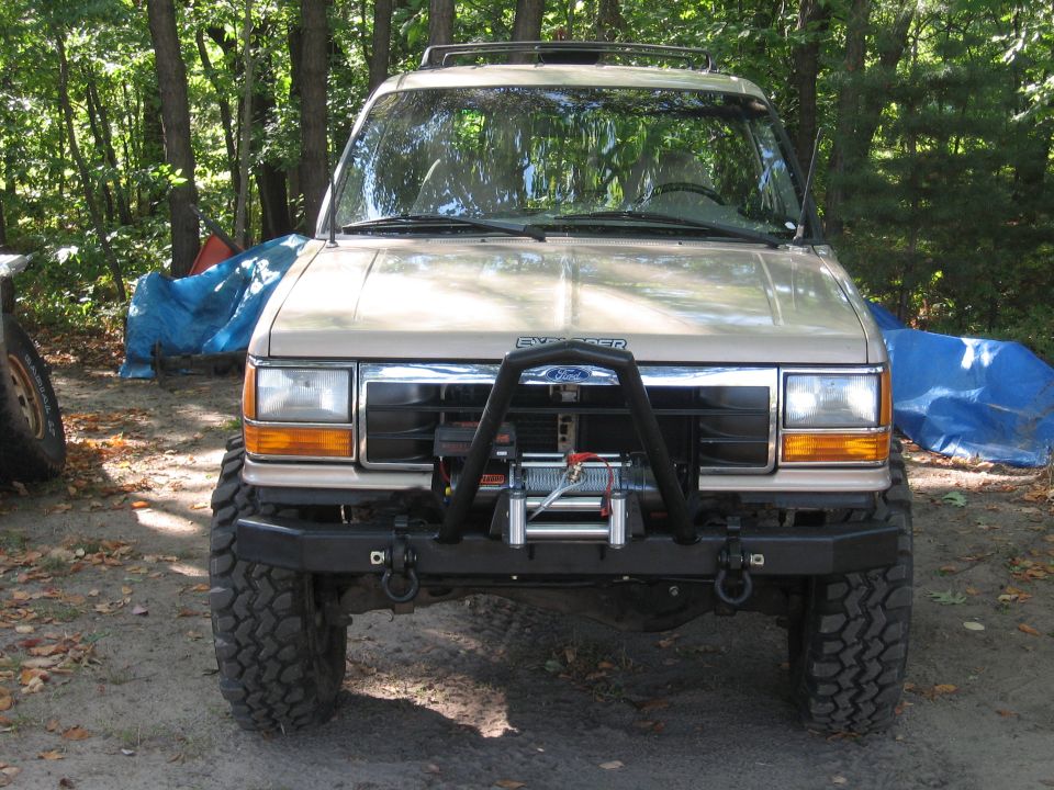 Tan SUV front view with winch and bull bar