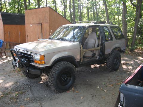 1979 Ford Bronco - Modified 1989 Ford Bronco II with off-road modifications parked outdoors.