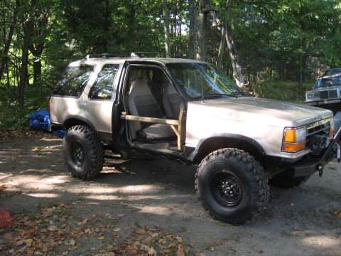 1979 Ford Bronco - This lifted SUV has been modified with off-road tires and has had its doors removed for a appearance.