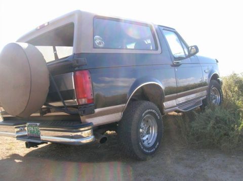 1996 Ford Bronco - This 1996 Ford Bronco is shown in a rear 3/4 view, its signature spare tire carrier.