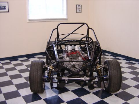 1996 Ford Bronco - This is a custom-built vehicle chassis, not a 1996 Ford Bronco, with its V8 engine and suspension components exposed.