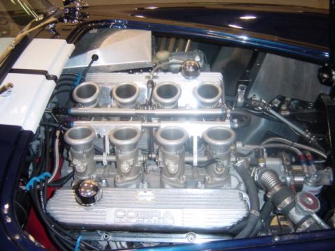 1996 Ford Bronco - Engine bay view of a V8 motor with prominent "COBRA" branding on the valve covers.