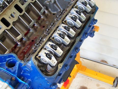 1990 Ford Bronco - Engine block with rocker arms and valve springs visible, part number W-301-MC 08.