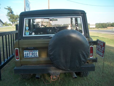1979 Ford Bronco - Rear view of a 1978 Ford Bronco with a spare tire mounted and a for sale sign visible.