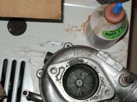 2001 Pontiac Trans Am - Close-up of a turbocharger, identified as IHI by the branding on its housing.
