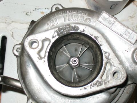 2001 Pontiac Trans Am - A turbocharger part is shown, with visible text indicating it is a Warner-Ishi IHI Turbo.