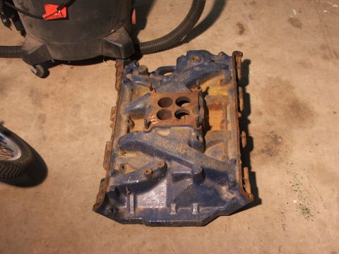 1965 Ford Mustang - This is an engine intake manifold, not a 1965 Ford Mustang.