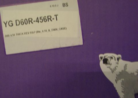 1974 Ford Bronco - A label with part information and a polar bear graphic is shown against a purple background.