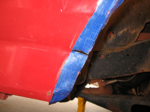 1995 Ford F-150 - Cut along the seam of the fender and start bending.