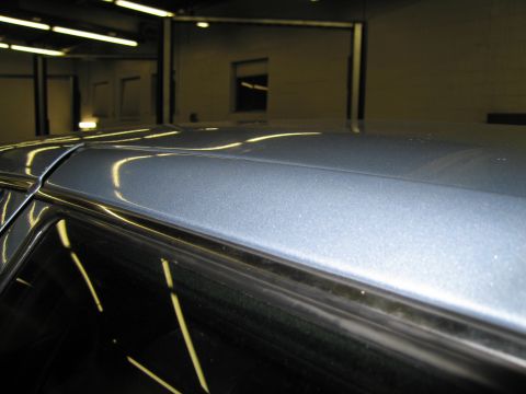1991 Ford LTD Crown Victoria - Detail shot of the roofline and window trim on a 1991 Ford Crown Victoria LTD.