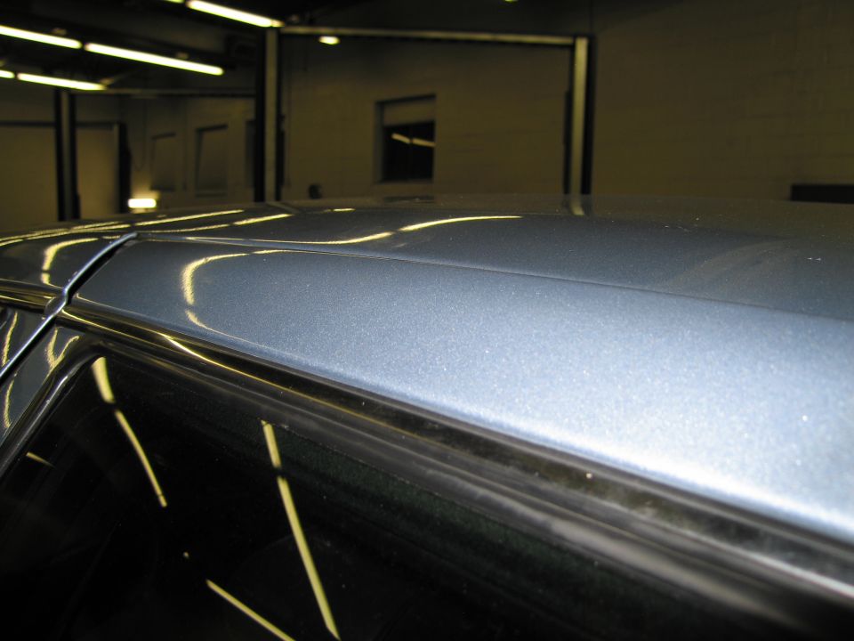 Close-up of 1991 Ford Crown Victoria LTD roofline and window trim