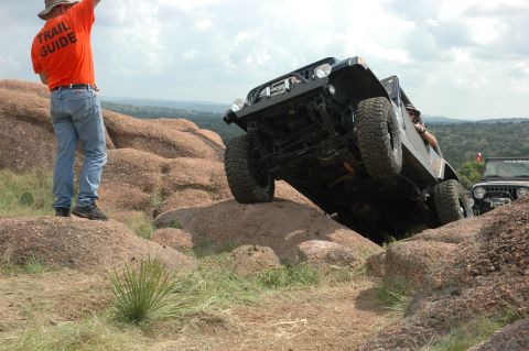 2001 Jeep Wrangler - Jeep Wrangler navigating a challenging rocky terrain during an off-road excursion.