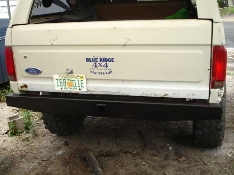 1989 Ford Bronco - Rear view of a 1989 Ford Bronco, an aftermarket bumper and a Florida license plate.