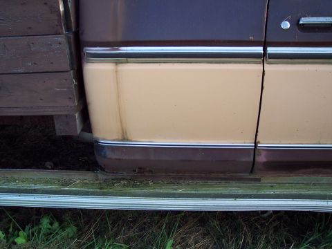 1978 Ford F-250 - Side view of a two-tone truck with chrome trim and visible rust on the lower body panels.