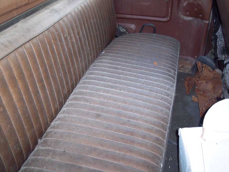 Brown vinyl bench seat interior with ribbed pattern