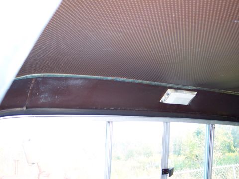 1978 Ford F-250 - Close-up view of the headliner and interior trim of a vehicle.