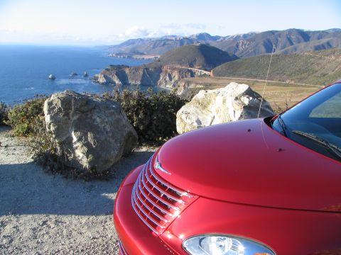 2005 Chrysler PT Cruiser - Red 2005 Chrysler PT Cruiser parked with a scenic ocean view.