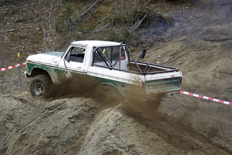 1979 Ford F-150 off-roading on a dirt hill