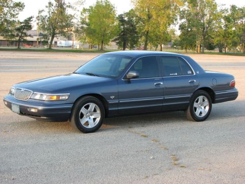 1985 Mercury Grand Marquis - This later model Mercury Grand Marquis is shown from the front three-quarter view.