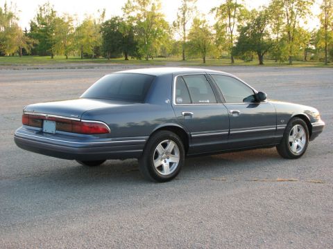 1985 Mercury Grand Marquis - This Mercury Grand Marquis is a later model, likely from the late 1990s or early 2000s.