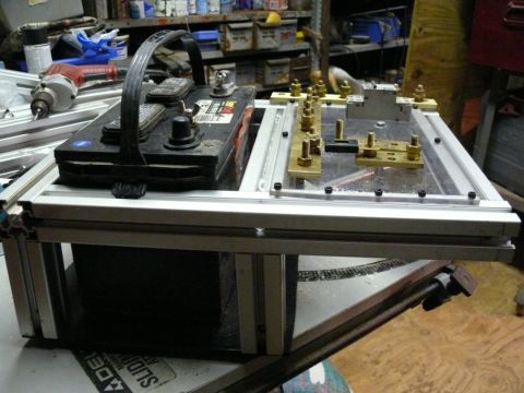 1988 Ford Bronco - Custom mount holds a car battery and electrical connections, possibly for a project or modification.