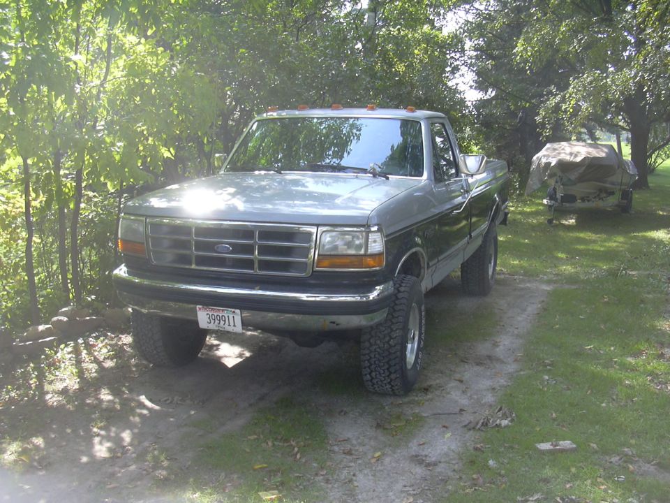 Front view of a two-tone Ford F-Series pickup truck, circa 1995