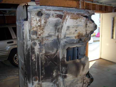 1979 Ford F-150 - The heavily corroded undercarriage of a vehicle is shown, with visible signs of rust and metalwork.