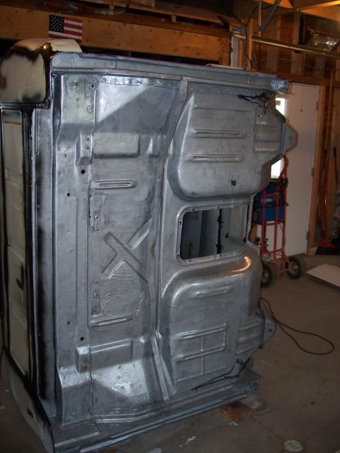 1979 Ford F-150 - The underbody of a 1979 Ford F-150 truck, painted silver and showing structural details.