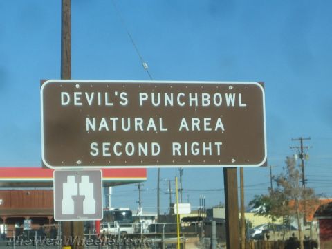 1968 Ford Mustang - Signage indicates directions to Devil's Punchbowl Natural Area and a turn-off.