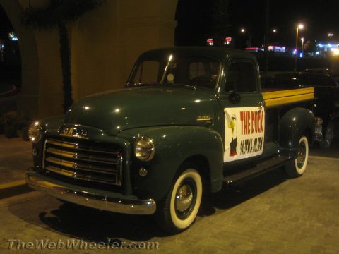 1968 Ford Mustang - This vintage GMC pickup truck features a distinctive graphic on its door, adding a unique touch to its classic design.