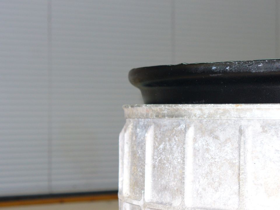 Black rim on a silver hub with Supermotors.net logo