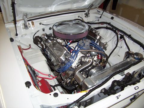 1978 Ford Mustang II - Engine bay view of a V8 engine with chrome accents and a large air filter.