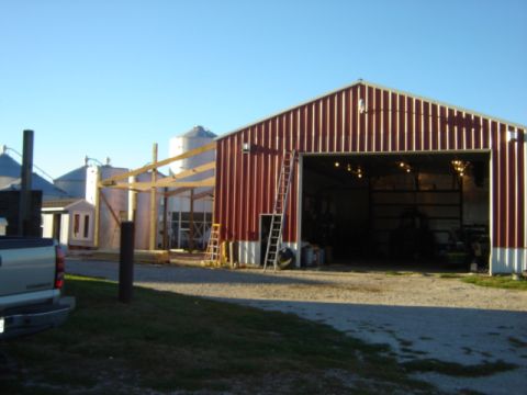 1992 Ford Bronco - Farm scene with silos, a red barn, and a pickup truck under a clear blue sky.