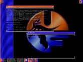 1992 Ford Bronco - A computer screen shows a graphical logo and multiple text-based windows, suggesting a software or operating system interface.