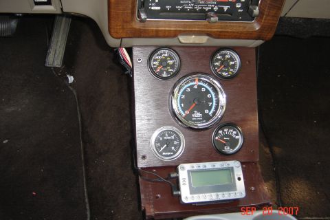1989 Ford Crown Victoria LTD - Custom gauge cluster with a digital display unit installed in the center console of a vehicle.