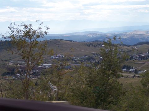 1972 Ford Ranchero - View of a town in a valley with mountains in the background.