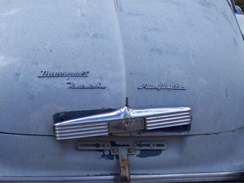 1972 Ford Ranchero - Close-up of the hood emblems and chrome detail on an older Nash vehicle.